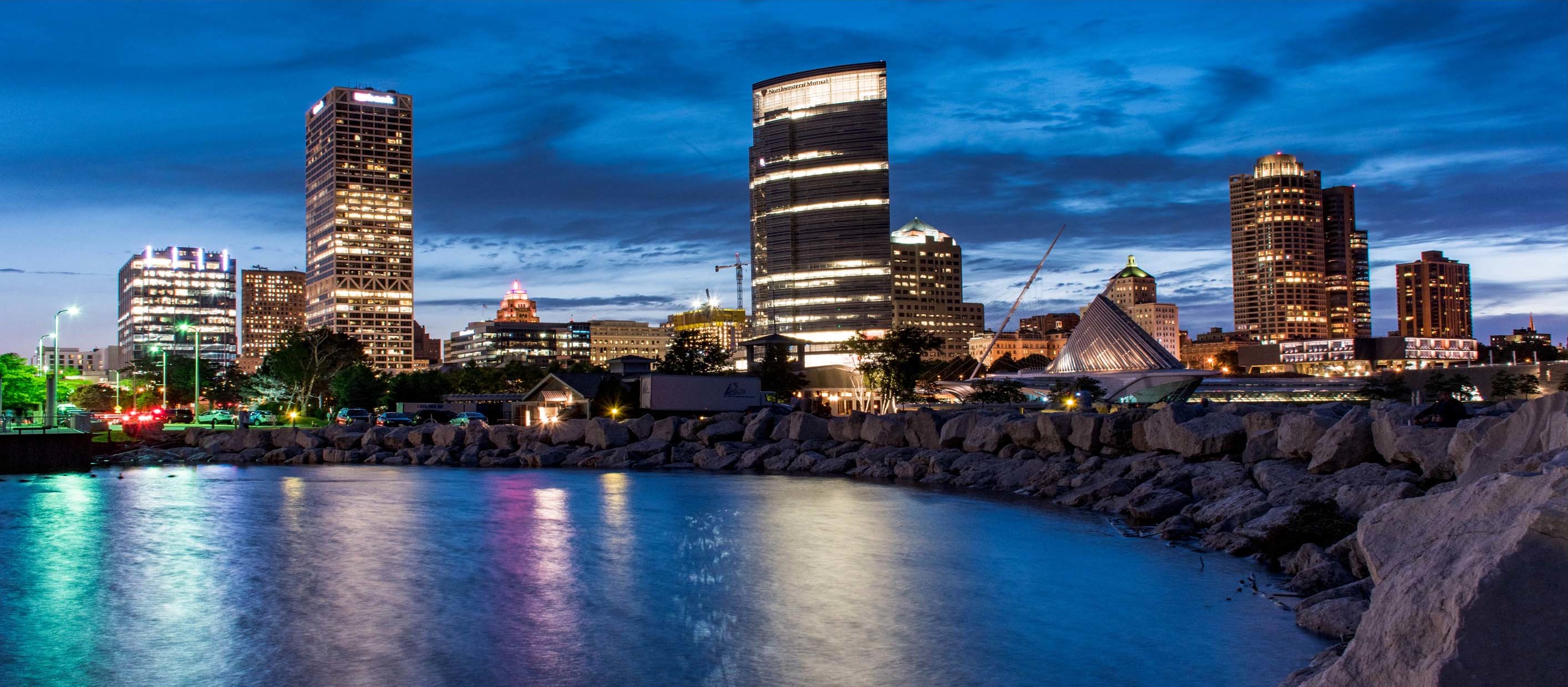 Milwaukee skyline along Lake Michigan at dusk